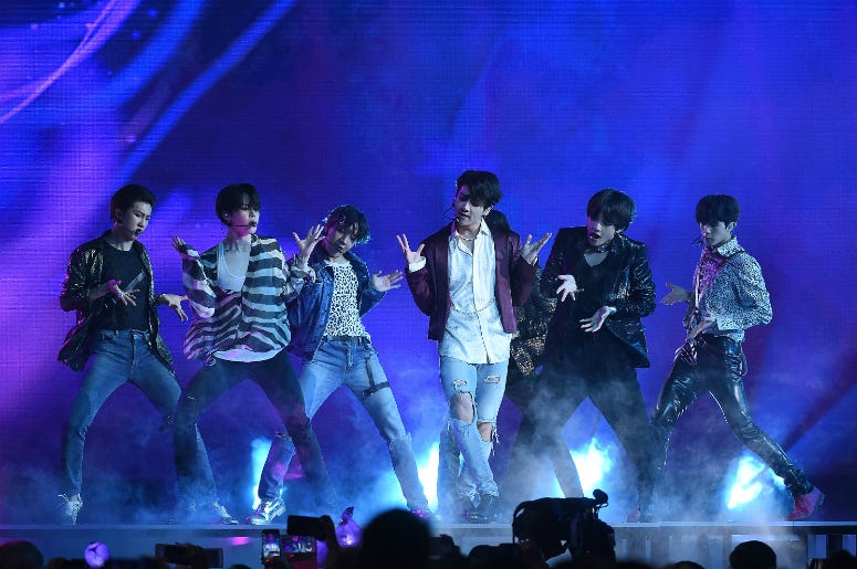 Jungkook, Jimin, V, Suga, Jin, j-hope of BTS perform at the 2018 Billboard Music Awards at MGM Grand Garden Arena on May 20, 2018 in Las Vegas, Nevada. Jungkook, Jimin, V, Suga, Jin, j-hope of BTS perform at the 2018 Billboard Music Awards at MGM Grand Garden Arena on May 20, 2018 in Las Vegas, Nevada.