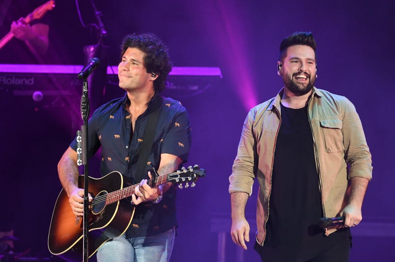 Recording artists Dan Smyers and Shay Mooney of Dan + Shay perform at the Coral Sky Smphitheatre Recording artists Dan Smyers and Shay Mooney of Dan + Shay perform at the Coral Sky Smphitheatre