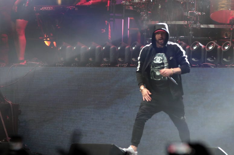 Eminem performs at the Coachella Valley music and Arts Festival at Empire Polo Club. Eminem performs at the Coachella Valley music and Arts Festival at Empire Polo Club.