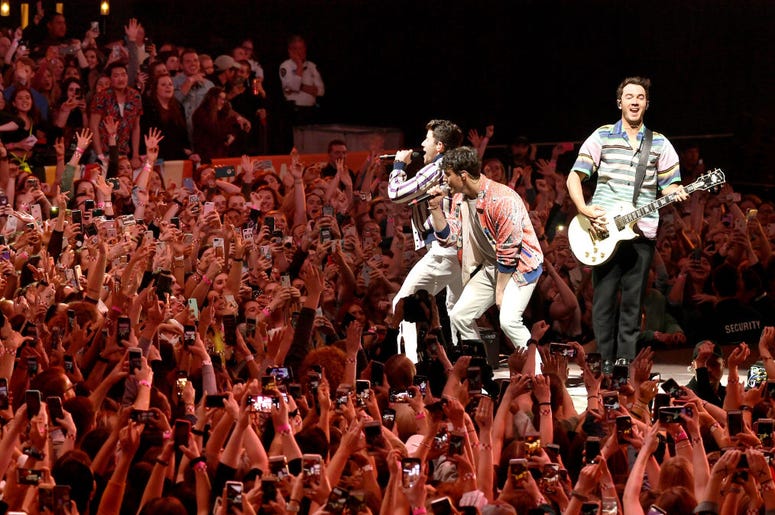 Nick Jonas, Joe Jonas, and Kevin Jonas of the Jonas Brothers perform onstage at the March Madness Music Series featuring Jonas Brothers presented by Coca-Cola during the NCAA March Madness Music Series at The Armory on April 06, 2019 in Minneapolis, MN Nick Jonas, Joe Jonas, and Kevin Jonas of the Jonas Brothers perform onstage at the March Madness Music Series featuring Jonas Brothers presented by Coca-Cola during the NCAA March Madness Music Series at The Armory on April 06, 2019 in Minneapolis, MN