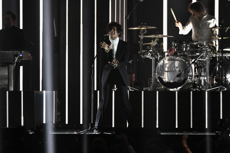 Matthew Healy performs with The 1975 on stage at The BRIT Awards 2017 Matthew Healy performs with The 1975 on stage at The BRIT Awards 2017