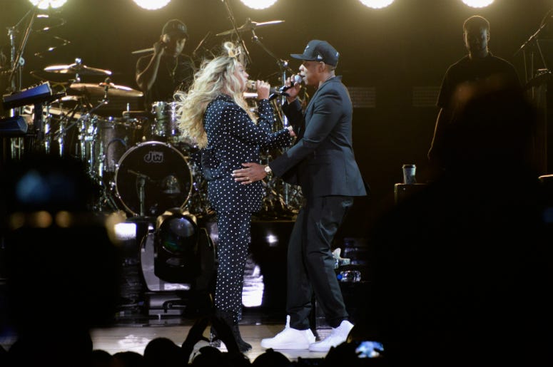 Beyonce & Jay-Z Beyonce and Jay Z perform on stage during a Get Out The Vote concert in support of Hillary Clinton at Wolstein Center on November 4, 2016 in Cleveland, Ohio. With less than a week to go until election day.