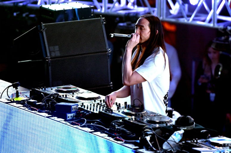 Steve Aoki LOS ANGELES, CA - MARCH 18: DJ Steve Aoki performs onstage during AMPLIFY 2017 presented by 97.1 AMP Radio at The Shrine Expo Hall on March 18, 2017 in Los Angeles, California.