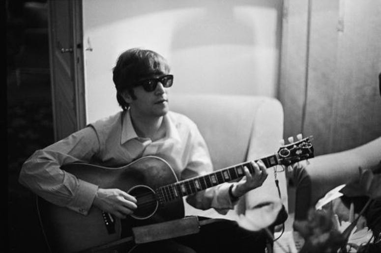 John Lennon with guitar