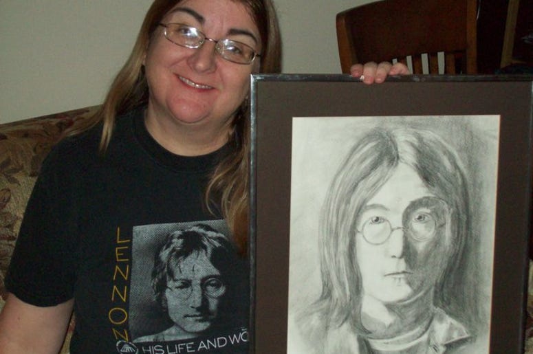 Kitty Dunn and a drawing of John Lennon