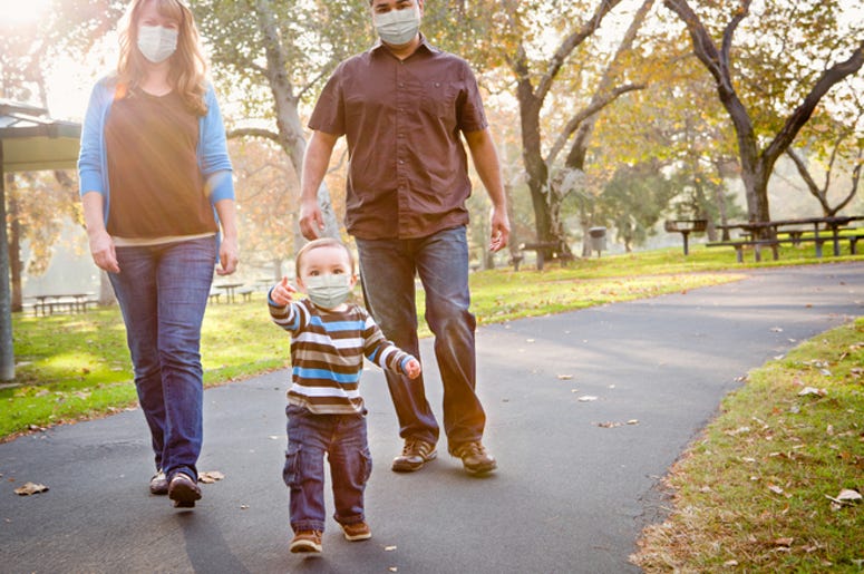 family wearing face masks