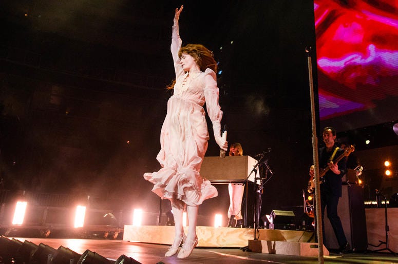 Florence Welch of Florence and the Machine performs onstage at The SAP Center during the ALT 105.3 Not So Silent Night in San Jose, California Florence Welch of Florence and the Machine performs onstage at The SAP Center during the ALT 105.3 Not So Silent Night in San Jose, California