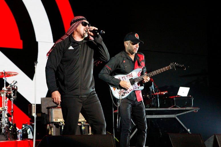 B-Real and Tom Morello of Prophets of Rage perform onstage during KROQ Almost Acoustic Christmas B-Real and Tom Morello of Prophets of Rage perform onstage during KROQ Almost Acoustic Christmas