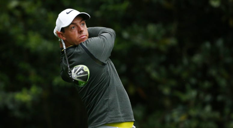 Rory McIlroy hits a tee shot on the 11th hole during a practice round at Augusta National GC. Rory McIlroy hits a tee shot on the 11th hole during a practice round at Augusta National GC.