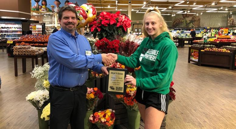 Kayce and 76th & Rawson Store Director Rick Kloth