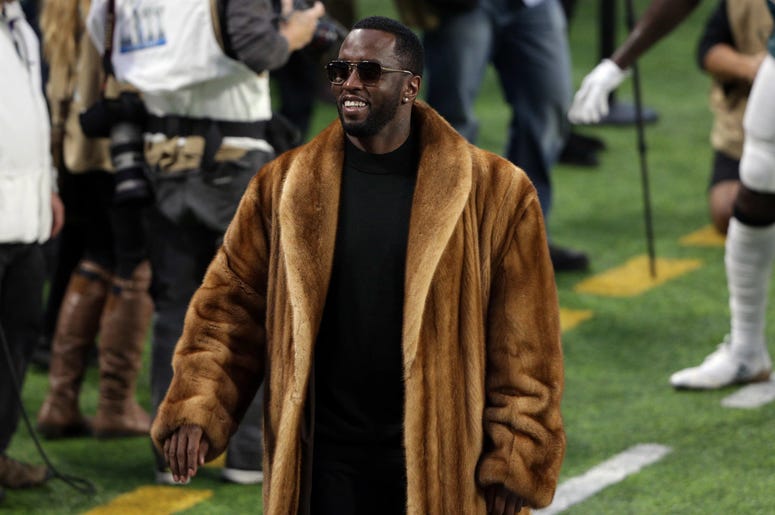 Recording artist P. Diddy a/k/a Sean Combs prior to the game between the New England Patriots Recording artist P. Diddy a/k/a Sean Combs prior to the game between the New England Patriots