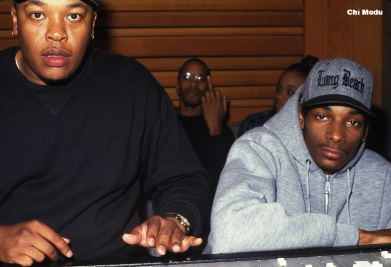 Snoop Doggy Dogg, Dr. Dre, and Warren G recording "Doggy Style" in Los Angeles. (1993) Snoop Doggy Dogg in the studio with Dr. Dre and Warren G (in back). Snoop was recording his multi-platinum album, 'Doggy Style' in Los Angeles in 1993. This photo is from the Defining Years of Hip-Hop 1990-2000 (Photo by Chi Modu/diverseimages)
