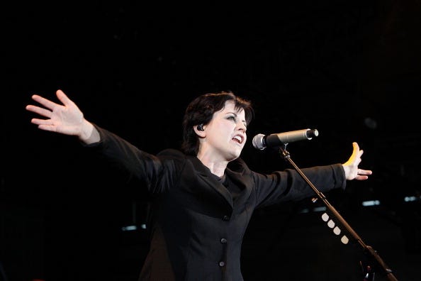 Dolores O'Riordan from The Cranberries performs during F1 Rocks! Melbourne at Sidney Myer Music Bowl on March 17, 2012 in Melbourne, Australia. Dolores O'Riordan from The Cranberries performs during F1 Rocks! Melbourne at Sidney Myer Music Bowl on March 17, 2012 in Melbourne, Australia.
