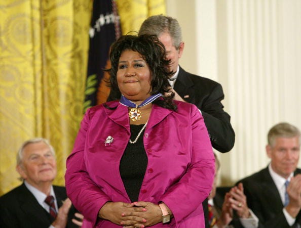 Aretha L. Franklin and President George W. Bush at the Freedom Awards Ceremony at the White House in Washington D.C. on November 9, 2005. Aretha L. Franklin and President George W. Bush at the Freedom Awards Ceremony at the White House in Washington D.C. on November 9, 2005.
