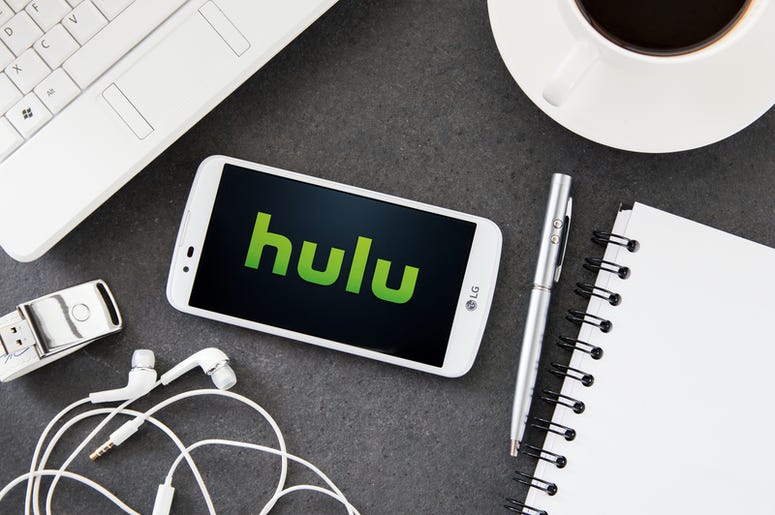 LG K10 with Hulu application laying on desk. LG K10 with Hulu application laying on desk.
