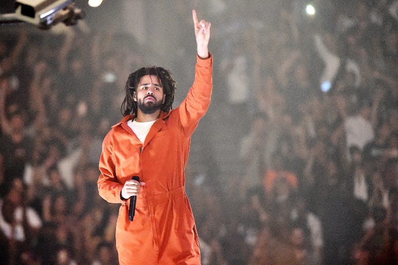 J. Cole performs at Barclays Center of Brooklyn on August 1, 2017 in the Brooklyn borough of New York City. J. Cole performs at Barclays Center of Brooklyn on August 1, 2017 in the Brooklyn borough of New York City.