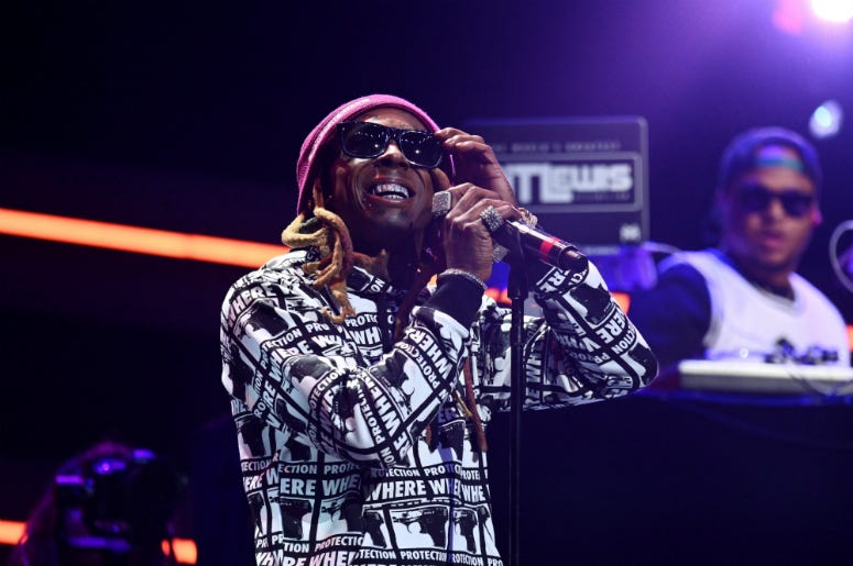 Lil Wayne performs onstage during the 4th Annual TIDAL X: Brooklyn at Barclays Center Lil Wayne performs onstage during the 4th Annual TIDAL X: Brooklyn at Barclays Center