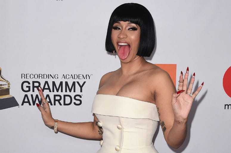 Cardi B NEW YORK - JANUARY 27: Cardi B at the 2018 Clive Davis Pre-Grammy Gala at the Sheraton New York Times Square on January 27, 2018 in New York, New York.