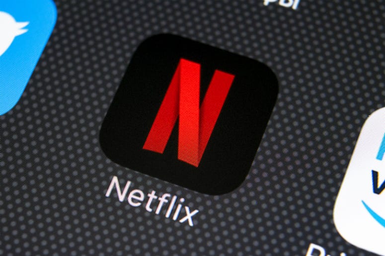 Netflix Netflix application icon on Apple iPhone X screen close-up. Netflix app icon. Netflix application. Social media network.
