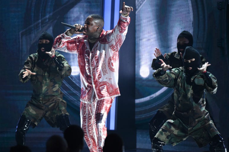 LOS ANGELES - JUNE 24: YG performs on the 2018 BET Awards at the Microsoft Theater on June 24, 2018 in Los Angeles, California. LOS ANGELES - JUNE 24: YG performs on the 2018 BET Awards at the Microsoft Theater on June 24, 2018 in Los Angeles, California.