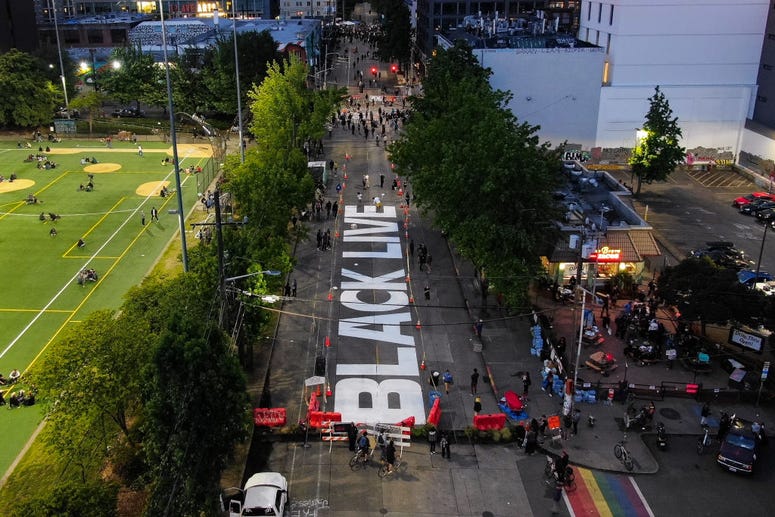 Wide angle shot of the BLACK LIVES MATTER painting