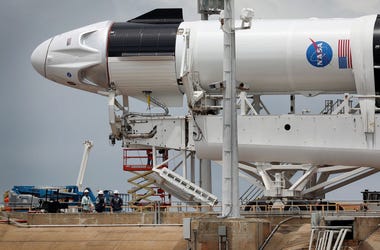 Crew Dragon Capsule Atop SpaceX Falcon 9 Rocket Moves Into Position
