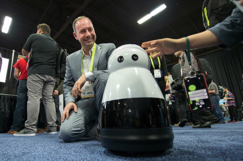 Mike Beebe, of Mayfield Robotics, shows off Kuri the company's home robot at CES Unveiled Las Vegas at the Bellagio Convention Center. Mike Beebe, of Mayfield Robotics, shows off Kuri the company's home robot at CES Unveiled Las Vegas at the Bellagio Convention Center.