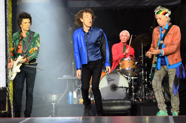 Ronnie Wood, Mick Jagger, Charlie Watts and Keith Richards of The Rolling Stones perform on stage at the Principality Stadium in Cardiff on June 15, 2018 Ronnie Wood, Mick Jagger, Charlie Watts and Keith Richards of The Rolling Stones perform on stage at the Principality Stadium in Cardiff on June 15, 2018