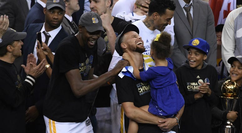 Golden State Warriors forward Kevin Durant (35) and guard Stephen Curry (30) celebrate after winning the 2017 NBA Finals. Golden State Warriors forward Kevin Durant (35) and guard Stephen Curry (30) celebrate after game five of the 2017 NBA Finals against the Cleveland Cavaliers at Oracle Arena.