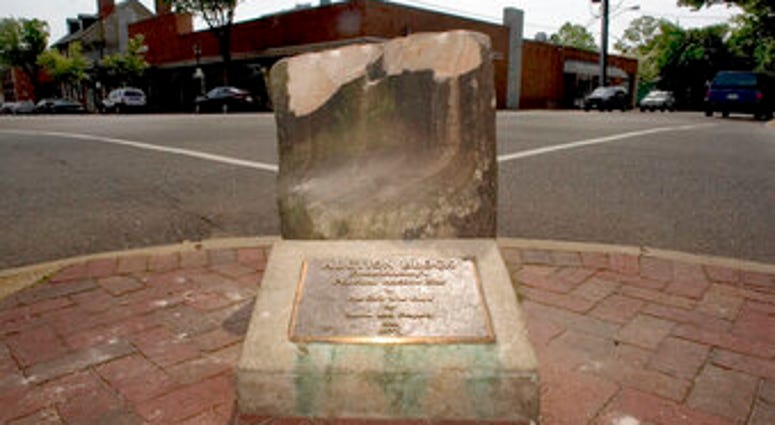 The historic pre-civil war auction block for slaves and property at the corner of Charles and William Streets in downtown Fredericksburg, Va. (Reza A Marvashti/The Free Lance-Star via AP, File) The historic pre-civil war auction block for slaves and property at the corner of Charles and William Streets in downtown Fredericksburg, Va. (Reza A Marvashti/The Free Lance-Star via AP, File)