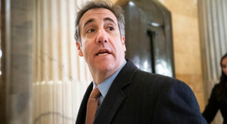 FILE - In this March 6, 2019 file photo, Michael Cohen, President Donald Trump's former lawyer, returns to testify on Capitol Hill in Washington. (AP Photo/J. Scott Applewhite, File) FILE - In this March 6, 2019 file photo, Michael Cohen, President Donald Trump's former lawyer, returns to testify on Capitol Hill in Washington. (AP Photo/J. Scott Applewhite, File)