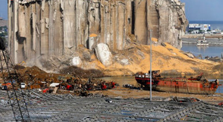 Earth moving equipment and rescue workers search for victims,Monday, Aug. 10, 2020, in Beirut, Lebanon, near the site of last week's explosion that hit the city's seaport. (AP Photo/Bilal Hussein) Earth moving equipment and rescue workers search for victims,Monday, Aug. 10, 2020, in Beirut, Lebanon, near the site of last week's explosion that hit the city's seaport. (AP Photo/Bilal Hussein)