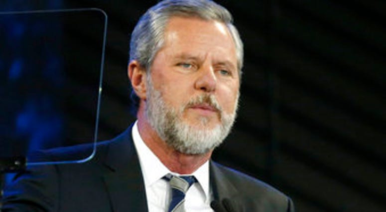 FILE - In this Nov. 28, 2018, file photo, Liberty University President Jerry Falwell Jr. speaks before a convocation at the university in Lynchburg, Va. (AP Photo/Steve Helber, File) FILE - In this Nov. 28, 2018, file photo, Liberty University President Jerry Falwell Jr. speaks before a convocation at the university in Lynchburg, Va. (AP Photo/Steve Helber, File)