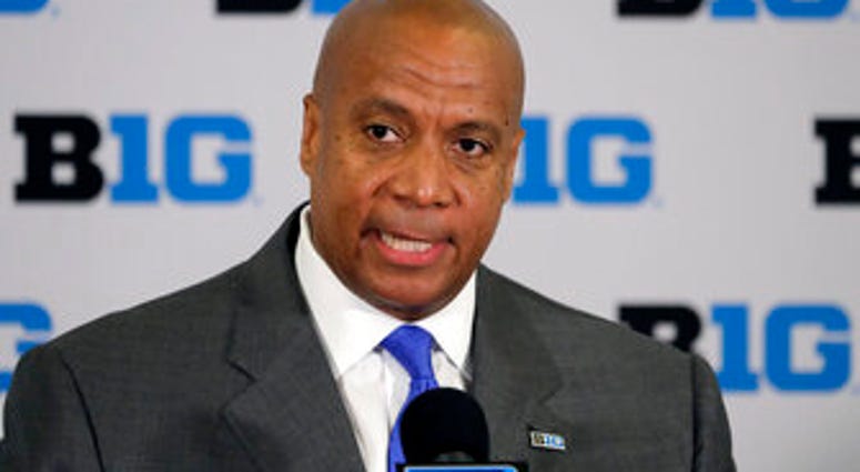 FILE - In this June 4, 2019, file photo, Kevin Warren talks to reporters after being named Big Ten Conference Commissioner during a news conference in Rosemont, Ill. (AP Photo/Charles Rex Arbogast, File) FILE - In this June 4, 2019, file photo, Kevin Warren talks to reporters after being named Big Ten Conference Commissioner during a news conference in Rosemont, Ill. (AP Photo/Charles Rex Arbogast, File)