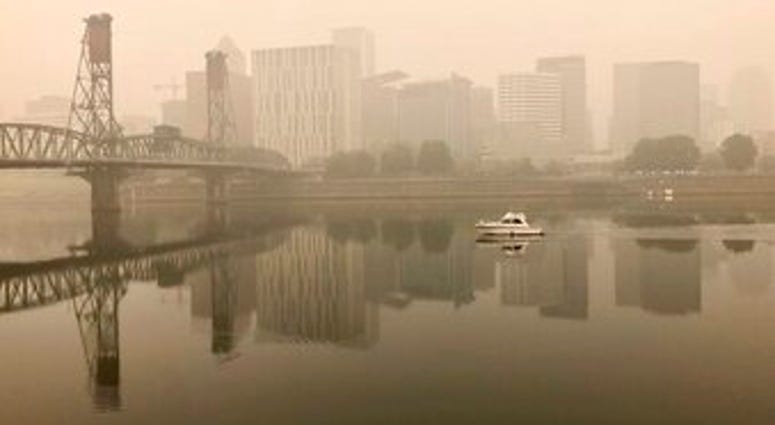 A view of downtown Portland from the East Bank Esplanade is seen on Monday, Sept. 14, 2020. (AP Photo/Gillian Flaccus) A view of downtown Portland from the East Bank Esplanade is seen on Monday, Sept. 14, 2020. (AP Photo/Gillian Flaccus)