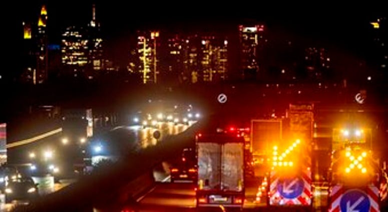 Cars and trucks drive on the main highway with the buildings of the banking district in background in Frankfurt, Germany, Monday, Sept. 14, 2020. (AP Photo/Michael Probst) Cars and trucks drive on the main highway with the buildings of the banking district in background in Frankfurt, Germany, Monday, Sept. 14, 2020. (AP Photo/Michael Probst)