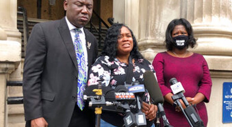 FILE - Tamika Palmer, mother of Breonna Taylor, addresses the media in Louisville, Ky., on Thursday, Aug. 13, 2020. (AP Photo/Dylan Lovan, FIle) FILE - Tamika Palmer, mother of Breonna Taylor, addresses the media in Louisville, Ky., on Thursday, Aug. 13, 2020. (AP Photo/Dylan Lovan, FIle)