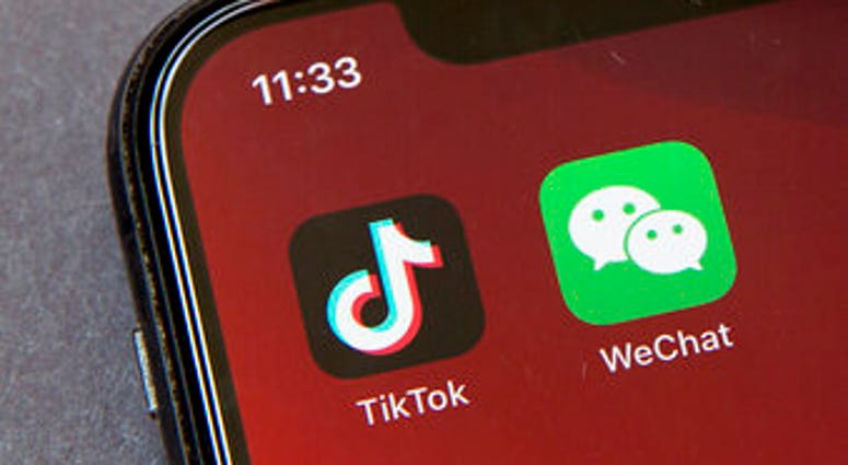 FILE - Icons for the smartphone apps TikTok and WeChat are seen on a smartphone screen in Beijing, in a Friday, Aug. 7, 2020 file photo. (AP Photo/Mark Schiefelbein, File) FILE - Icons for the smartphone apps TikTok and WeChat are seen on a smartphone screen in Beijing, in a Friday, Aug. 7, 2020 file photo. (AP Photo/Mark Schiefelbein, File)
