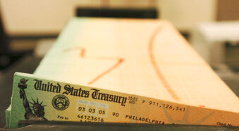 FILE - In this Feb. 11, 2005 file photo, trays of printed social security checks wait to be mailed from the U.S. Treasury's Financial Management services facility in Philadelphia. (AP Photo/Bradley C. Bower, File) FILE - In this Feb. 11, 2005 file photo, trays of printed social security checks wait to be mailed from the U.S. Treasury's Financial Management services facility in Philadelphia. (AP Photo/Bradley C. Bower, File)