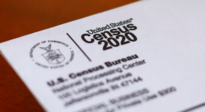 FILE - This Sunday, April 5, 2020, file photo shows an envelope containing a 2020 census letter mailed to a U.S. resident in Detroit. (AP Photo/Paul Sancya, File) FILE - This Sunday, April 5, 2020, file photo shows an envelope containing a 2020 census letter mailed to a U.S. resident in Detroit. (AP Photo/Paul Sancya, File)