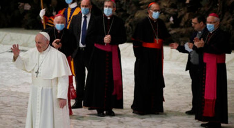 Pope Francis waves to faithful at the end of the weekly general audience in the Paul VI hall at the Vatican, Wednesday, Oct. 21, 2020. (AP Photo/Gregorio Borgia) Pope Francis waves to faithful at the end of the weekly general audience in the Paul VI hall at the Vatican, Wednesday, Oct. 21, 2020. (AP Photo/Gregorio Borgia)