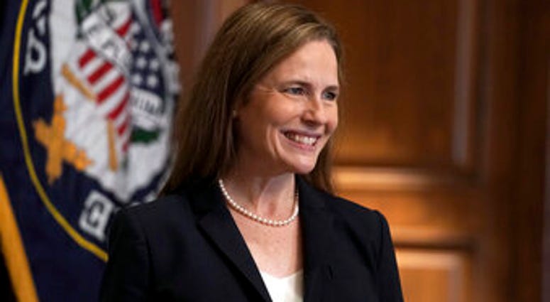 Supreme Court nominee Amy Coney Barrett, meets with Sen. Martha McSally, R-Ariz., Wednesday, Oct. 21, 2020, on Capitol Hill in Washington. (Greg Nash/Pool via AP) Supreme Court nominee Amy Coney Barrett, meets with Sen. Martha McSally, R-Ariz., Wednesday, Oct. 21, 2020, on Capitol Hill in Washington. (Greg Nash/Pool via AP)