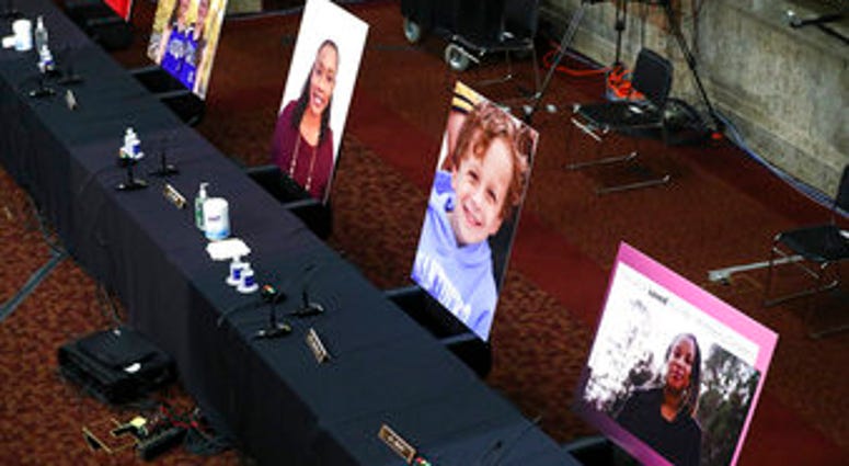 Images of people who've been helped by the Affordable Care Act (ACA) occupy the seats of Democratic senators boycotting a Senate Judiciary Committee business meeting on the nomination of Judge Amy Coney Barrett. (Hannah McKay/Pool via AP) Images of people who've been helped by the Affordable Care Act (ACA) occupy the seats of Democratic senators boycotting a Senate Judiciary Committee business meeting on the nomination of Judge Amy Coney Barrett. (Hannah McKay/Pool via AP)