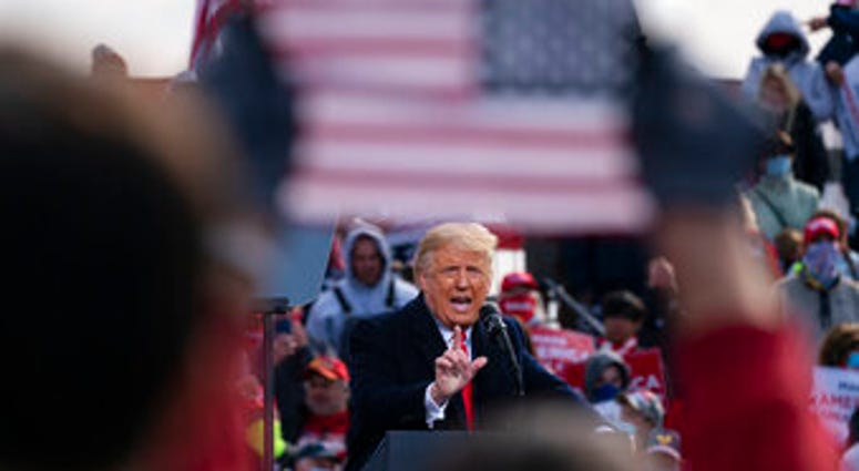 President Donald Trump speaks at a campaign rally at Manchester-Boston Regional Airport, Sunday, Oct. 25, 2020, in Londonderry, N.H. (AP Photo/Alex Brandon) President Donald Trump speaks at a campaign rally at Manchester-Boston Regional Airport, Sunday, Oct. 25, 2020, in Londonderry, N.H. (AP Photo/Alex Brandon)