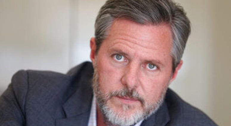 FILE - In this Nov. 16, 2016 file photo, Liberty University president Jerry Falwell Jr., poses during an interview in his offices at the school in Lynchburg, Va. (AP Photo/Steve Helber, File) FILE - In this Nov. 16, 2016 file photo, Liberty University president Jerry Falwell Jr., poses during an interview in his offices at the school in Lynchburg, Va. (AP Photo/Steve Helber, File)