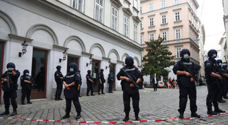 Police officers guard the scene in Vienna, Austria, Tuesday, Nov. 3, 2020. (AP Photo/Matthias Schrader) Police officers guard the scene in Vienna, Austria, Tuesday, Nov. 3, 2020. (AP Photo/Matthias Schrader)