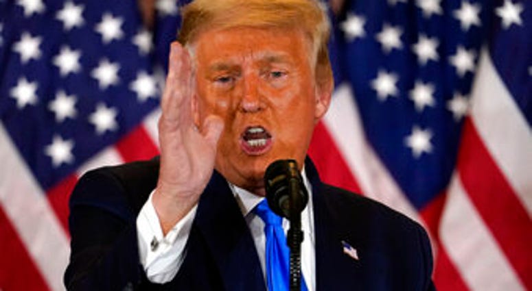 President Donald Trump speaks in the East Room of the White House, early Wednesday, Nov. 4, 2020, in Washington. (AP Photo/Evan Vucci) President Donald Trump speaks in the East Room of the White House, early Wednesday, Nov. 4, 2020, in Washington. (AP Photo/Evan Vucci)