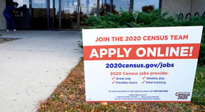 A sign is seen outside of IDES (Illinois Department of Employment Security) WorkNet center in Arlington Heights, Ill., Thursday, Nov. 5, 2020. Illinois reports biggest spike in unemployment claims of all states. (AP Photo/Nam Y. Huh) A sign is seen outside of IDES (Illinois Department of Employment Security) WorkNet center in Arlington Heights, Ill., Thursday, Nov. 5, 2020. Illinois reports biggest spike in unemployment claims of all states. (AP Photo/Nam Y. Huh)