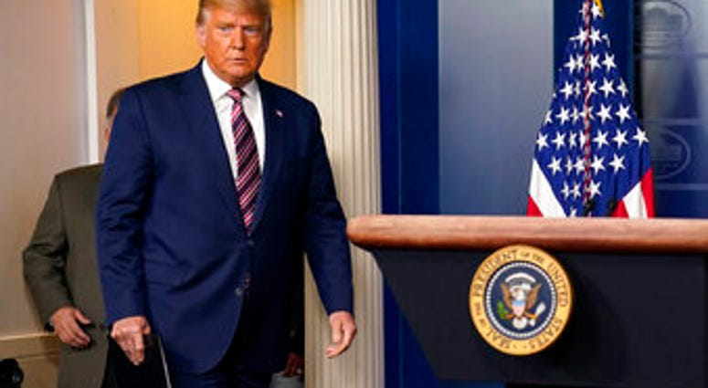 President Donald Trump arrives to speak at the White House, Thursday, Nov. 5, 2020, in Washington. (AP Photo/Evan Vucci) President Donald Trump arrives to speak at the White House, Thursday, Nov. 5, 2020, in Washington. (AP Photo/Evan Vucci)