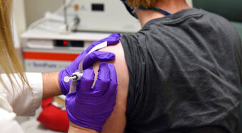 FILE - This May 4, 2020, file photo provided by the University of Maryland School of Medicine, shows the first patient enrolled in Pfizer's COVID-19 coronavirus vaccine clinical trial. (Courtesy of University of Maryland School of Medicine via AP, File) FILE - This May 4, 2020, file photo provided by the University of Maryland School of Medicine, shows the first patient enrolled in Pfizer's COVID-19 coronavirus vaccine clinical trial. (Courtesy of University of Maryland School of Medicine via AP, File)